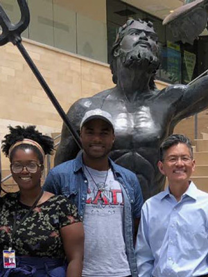 Students in the XULA-UCSD program posing for a photo in front of the King Triton fountain