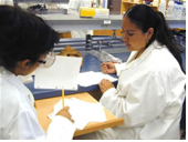 Two researchers working in the lab