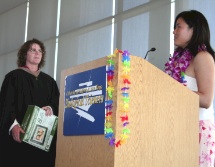 Alice Tsai presents Barbra Blake with a gift to acknowledge her role in founding BSSA