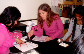Photo of Lindsay Lewellyn teaching two children