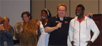 Steve Kay congratulates Gentry Patrick, winner of 2009's Biology Idol