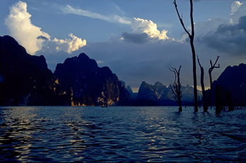 Water reservoir with mountains in the backdrop