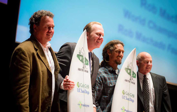Marty Gilchrist and Rob Machado and Steve Mayfield holding surfboards posing for a photo