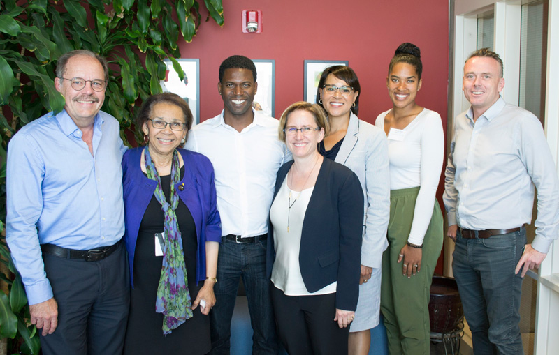 Shirley Malcolm standing with a group of folks at UC San Diego.