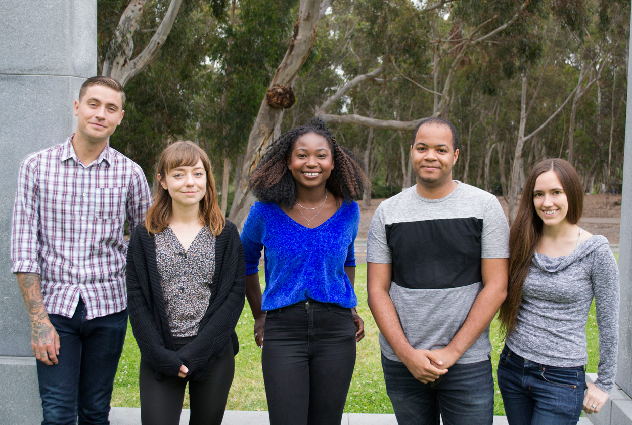  Chris Beierschmitt, Devon Birdseye, Rhea-Comfort Addo, Donte Stevens and Alana Gibson standing side by side on the grass