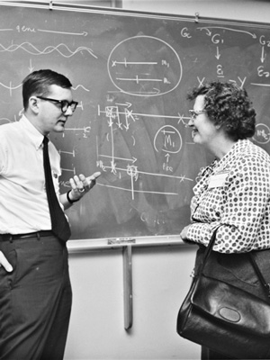 Don Helinski talking in front of a chalkboard